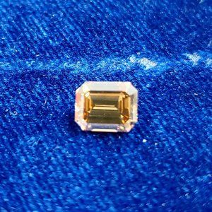 Fancy Deep Orangy Brown Emerald Cut Diamond